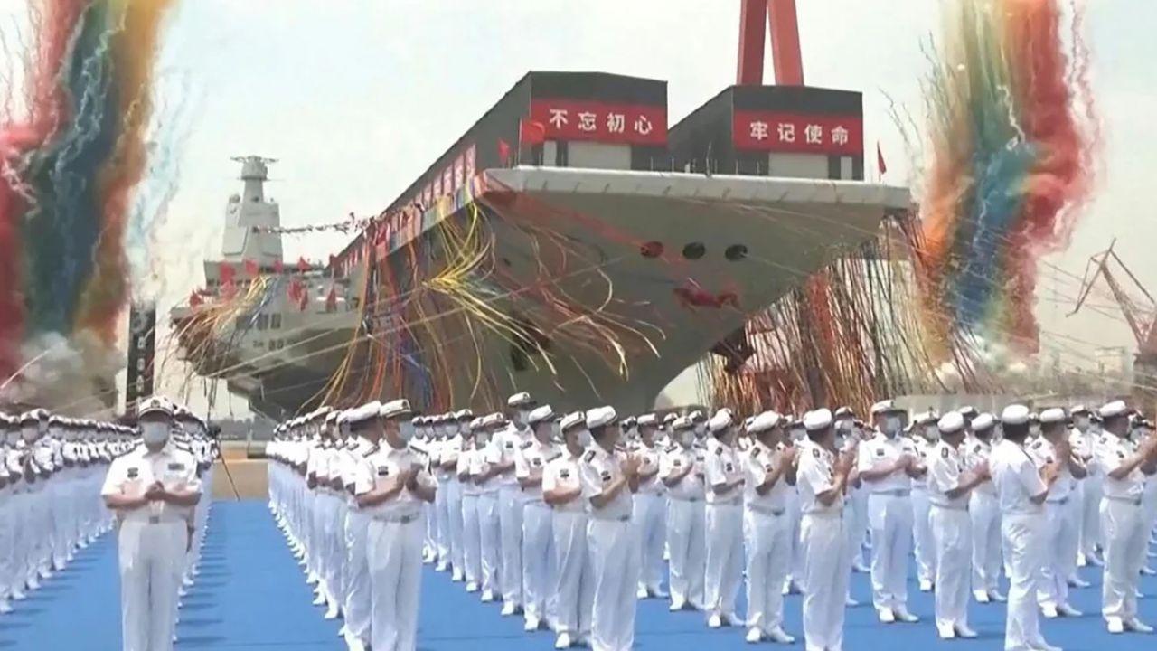 China unveils assault ship capable of launching fighter jets and operations