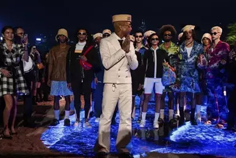 Pharrell Williams rocks Louis Vuitton on Hong Kong runway.