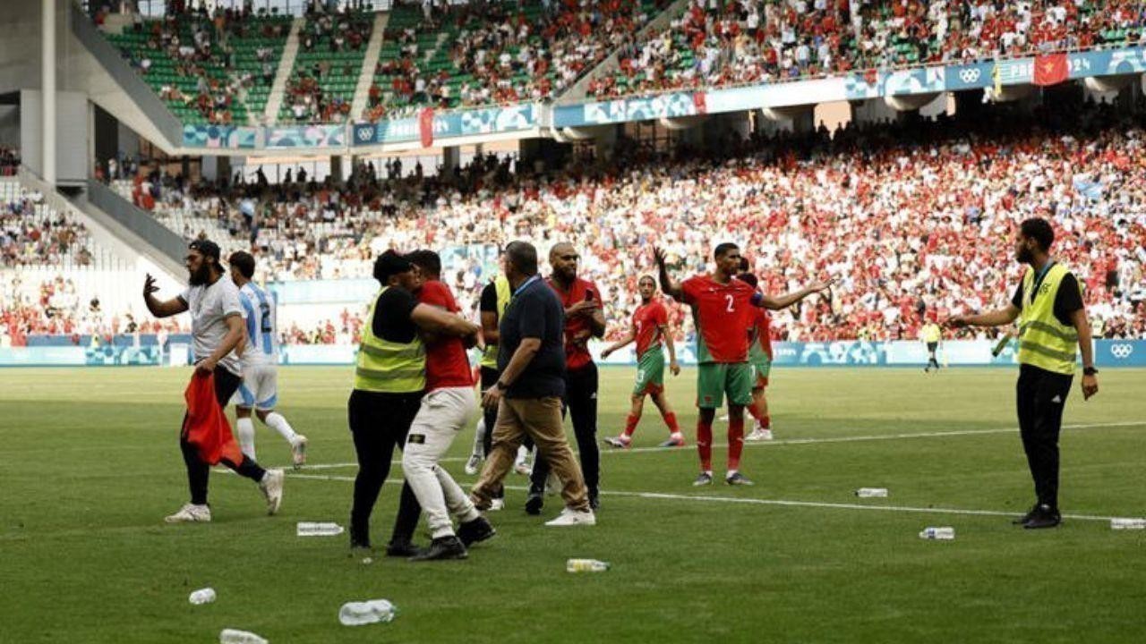 Violence Erupts as Morocco Fans Rush Field During Argentina-Olympic Soccer Clash