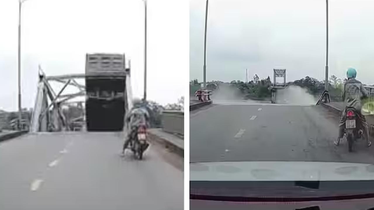 Bridge collapses in typhoons-hit Vietnam sending lorry and car into river