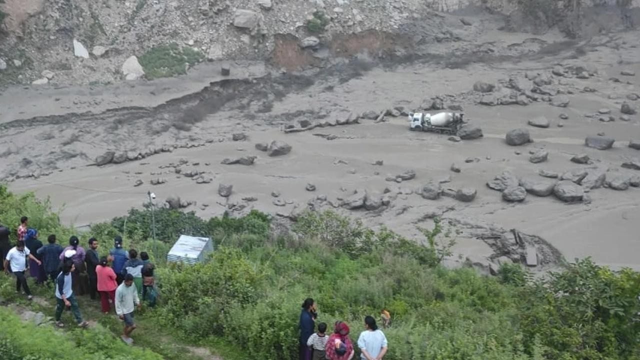Nepal-China Bridge Swept Away by Floods, 20 Missing